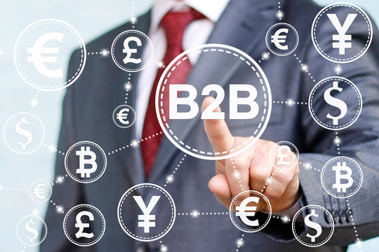 Business finance internet shopping trade exchange concept. Businessman presses B2B word icon on virtual screen on background of network currency eur, dollar, pound, yen. Business to business