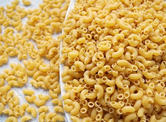 Raw small macaroni pasta for healthy easy recipes.