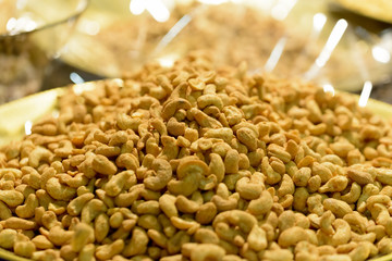 pile of roasted and salted cashew nuts in a bazaar