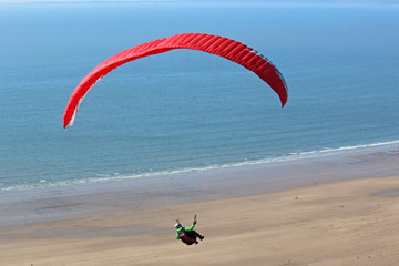 Paraglider above Rhossili beach