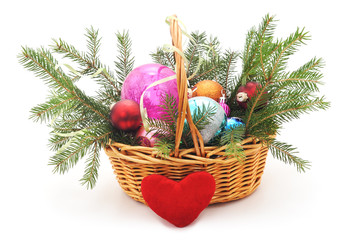 Christmas basket with toys and a heart.