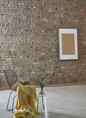 Fototapeta na wymiar new brown brick wall, dressing area old screen, living room designed for home office
