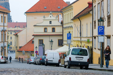 Obraz na płótnie Canvas Prague, Czechia - November, 23, 2016: cars parking on a street in an Old Town of Prague, Czechia
