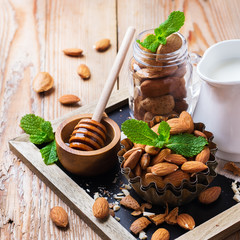 Almond milk with ingredients for healthy breakfast