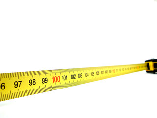 Centimeter tape measure. Isolated. Sends thoughts about motivation and success.