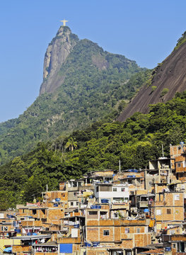 Brazil, City of Rio de Janeiro, View of the Favela Santa Marta  with Corcovado and the Christ Statue behind.