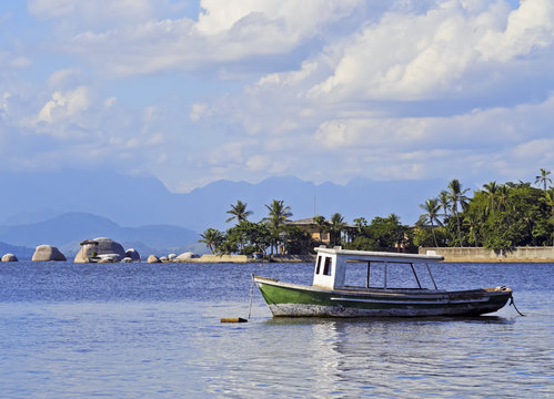 Brazil, State of Rio de Janeiro, Guanabara Bay, Paqueta Island, Boat near the coast of the island.