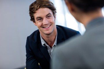 Businessman smiling and interacting