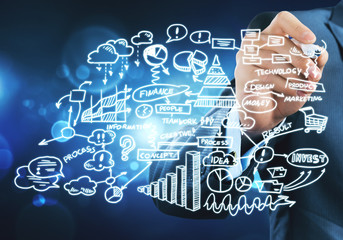 Man sketching business ideas 