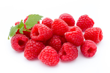 Ripe red raspberries isolated on white background.