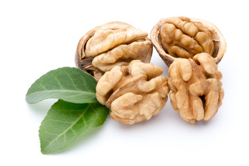 Walnut and walnut kernel isolated on the white background.
