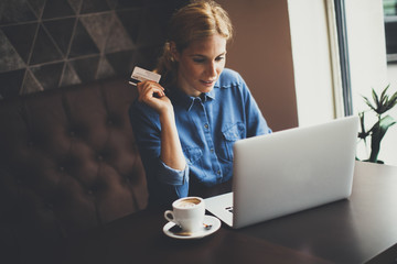 Young woman performs online shopping