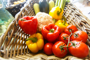 Fresh vegetables peppers,cauliflower, eggplant, zucchini, celery are in a wicker basket. Market, shop, vegetarian food.