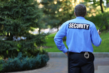 Male security guard protects house