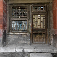 Fototapeta na wymiar External view of a door and window on an old building in Beijing.