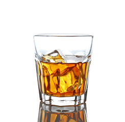 Glass of whisky with ice isolated on white