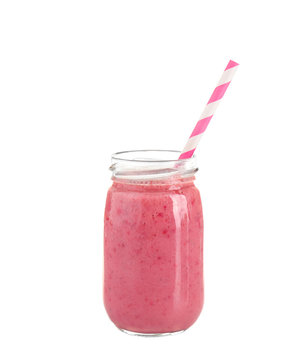 Fresh berry milkshake in glass jar isolated on white