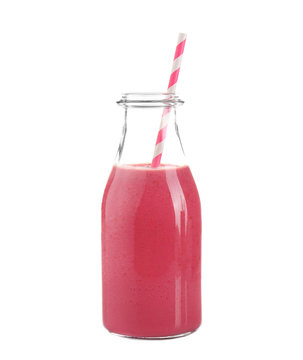 Fresh berry milkshake in glass bottle isolated on white