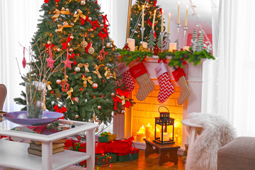 Fireplace in beautiful living room decorated for Christmas