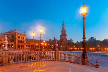 Patterned fence of the bridge on the Spain Square or Plaza de Espana in Seville during evening blue hour, Andalusia, Spain