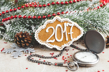gingerbread and clock on background of christmas toys