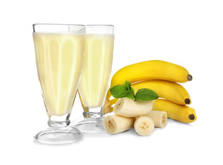 Tasty milk shake with banana isolated on white