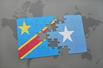 puzzle with the national flag of democratic republic of the congo and somalia on a world map