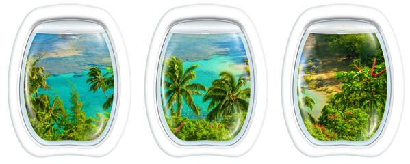 Three plane windows on Kee Beach, Kauai, Hawaii, United States, from a plane on the porthole windows. Copy space.
