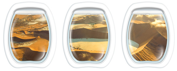 Three plane windows on Deadvlei, Sossusvlei desert in Namib Naukluft National Park, Namibia, from a plane on the porthole windows. Copy space.