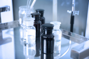 Glass bottles with medicines in gynecological room