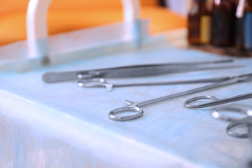 Gynecological tools on doctor's table in clinic