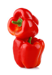 Red sweet peppers isolated on white