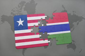 puzzle with the national flag of liberia and gambia on a world map