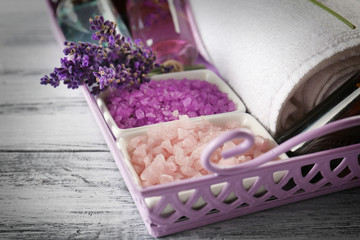 Set of natural spa treatments in basket, closeup