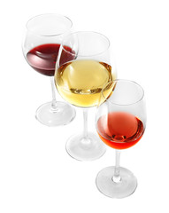 Three glasses with tasty wine on white background