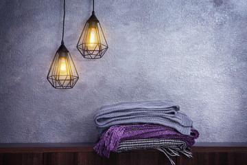 Modern interior of room with lamps hanging on wires