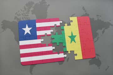puzzle with the national flag of liberia and senegal on a world map