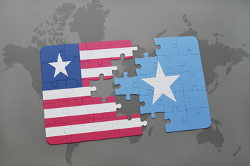 puzzle with the national flag of liberia and somalia on a world map