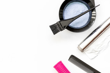Tools for hair dye and hairdye top view white background