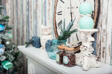 Christmas holiday background. Mint colors wallpaper and candles