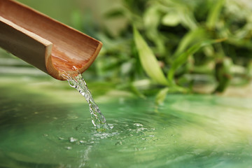 Beautiful spa composition with pouring water
