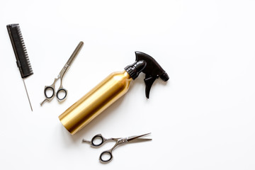 combs and hairdresser tools on white background top view