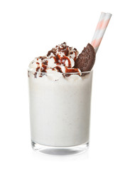 Tasty milk shake with chocolate topping and cookie on white background