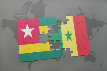 puzzle with the national flag of togo and senegal on a world map