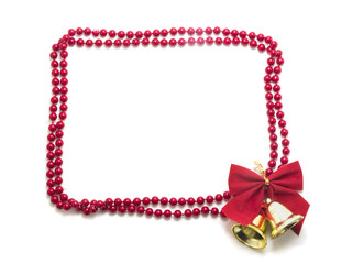 Frame made of pearls with red bow and christmas bells isolated o