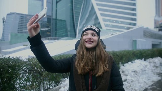 Woman taking selfie phone