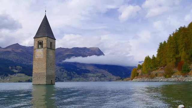 Curon bell tower emerges from the lake Resia - South Tyrol 