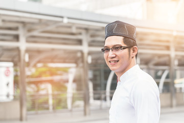 Young handsome businessman Arab Muslims standing at central of city. Business in city concept.