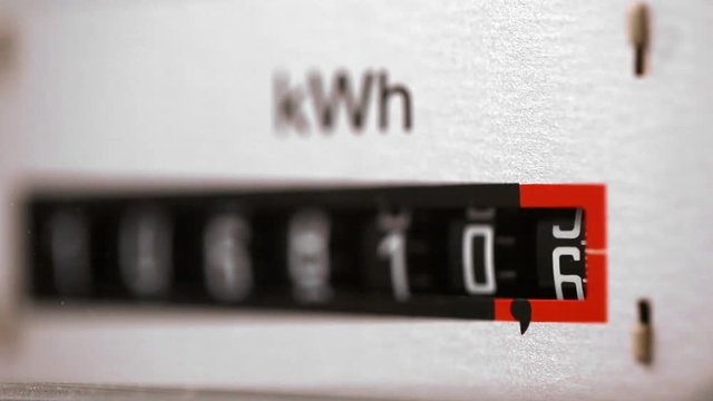 Electricity meter close up view with selective focus - energy consumption concept