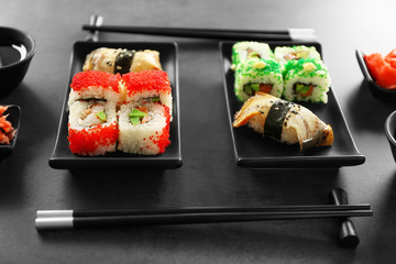 Delicious sushi set on ceramic plate